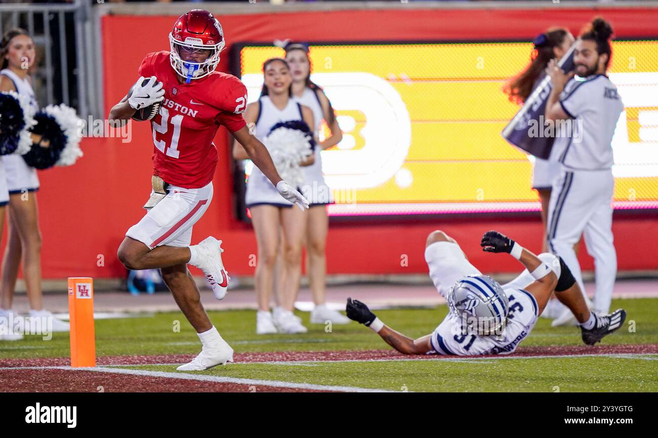 Houston, États-Unis. 14 septembre 2024. STACY SNEED (21 ans) court pour un touchdown de 65 yards en première mi-temps pendant le match entre les Rice Owls et les Cougars de Houston le 14 septembre 2024 au TDECU Stadium de Houston, Texas. Les Cougars de Houston ont battu les Rice Owls 33-7. (Photo par : Jerome Hicks/Sipa USA) crédit : Sipa USA/Alamy Live News Banque D'Images