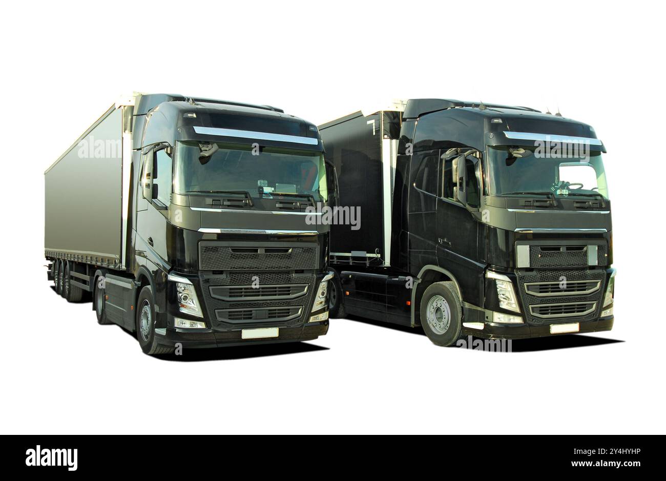 Deux gros camions avec une remorque Banque D'Images