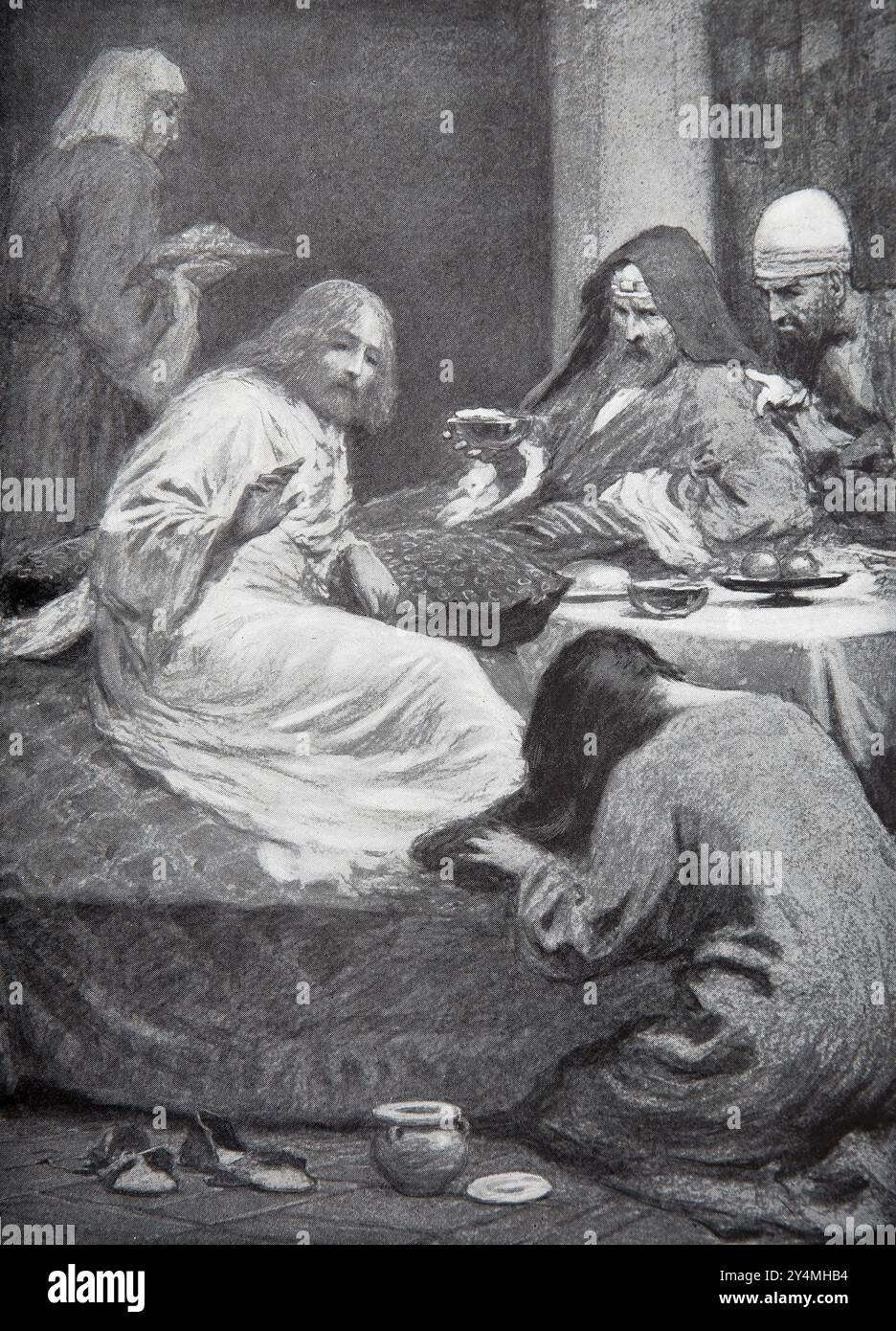 Marie-Madeleine lors D'Un banquet à la Maison du pharisien lavant les pieds de Jésus avec ses larmes et les séchait avec ses cheveux et les parfumait avec un onguent Banque D'Images