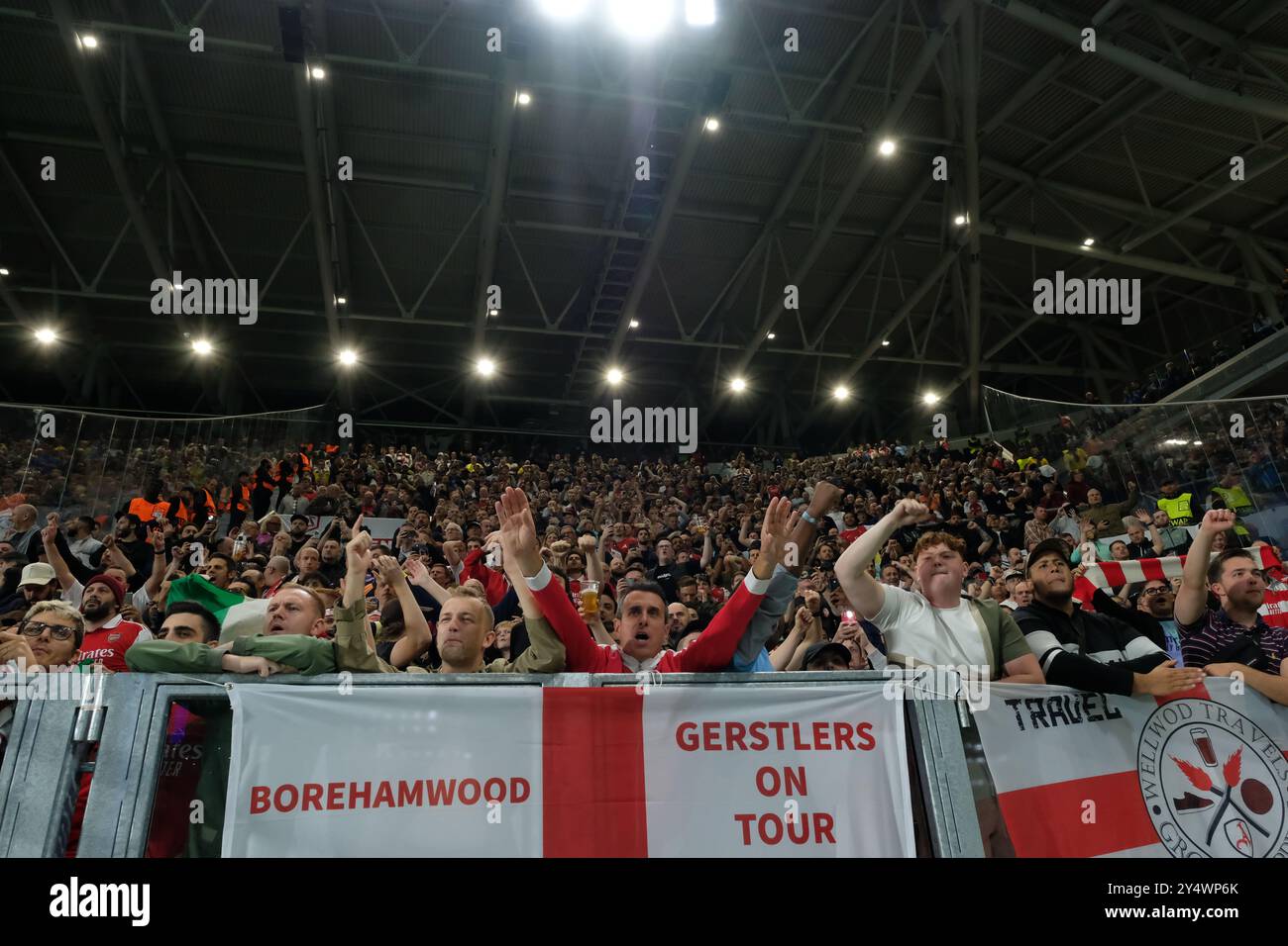 Les supporters d'Arsenal FC lors du match de l'UEFA Champions League 2024/2025 entre Atalanta BC et Arsenal FC au Gewiss Stadium le 19 septembre 2024, Bergame, Italie. Banque D'Images