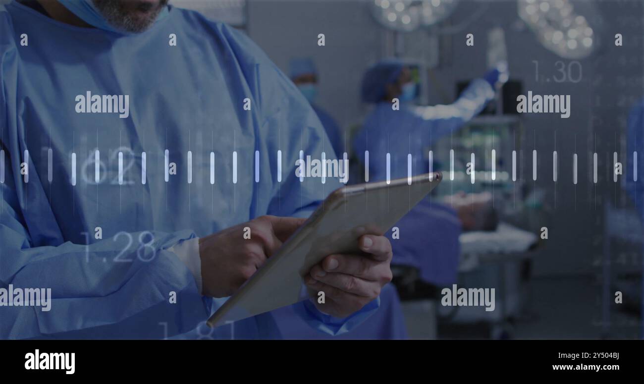 Image d'analyse de données médicales sur les chirurgiens travaillant en salle d'opération Banque D'Images