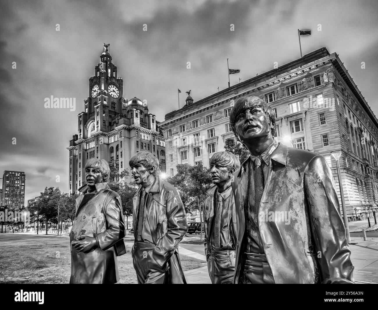 Cette image est la statue du groupe de musique de Liverpool les Beatles qui se sont établis comme l'un des groupes de rock les plus célèbres au monde dans les années 1960 Banque D'Images