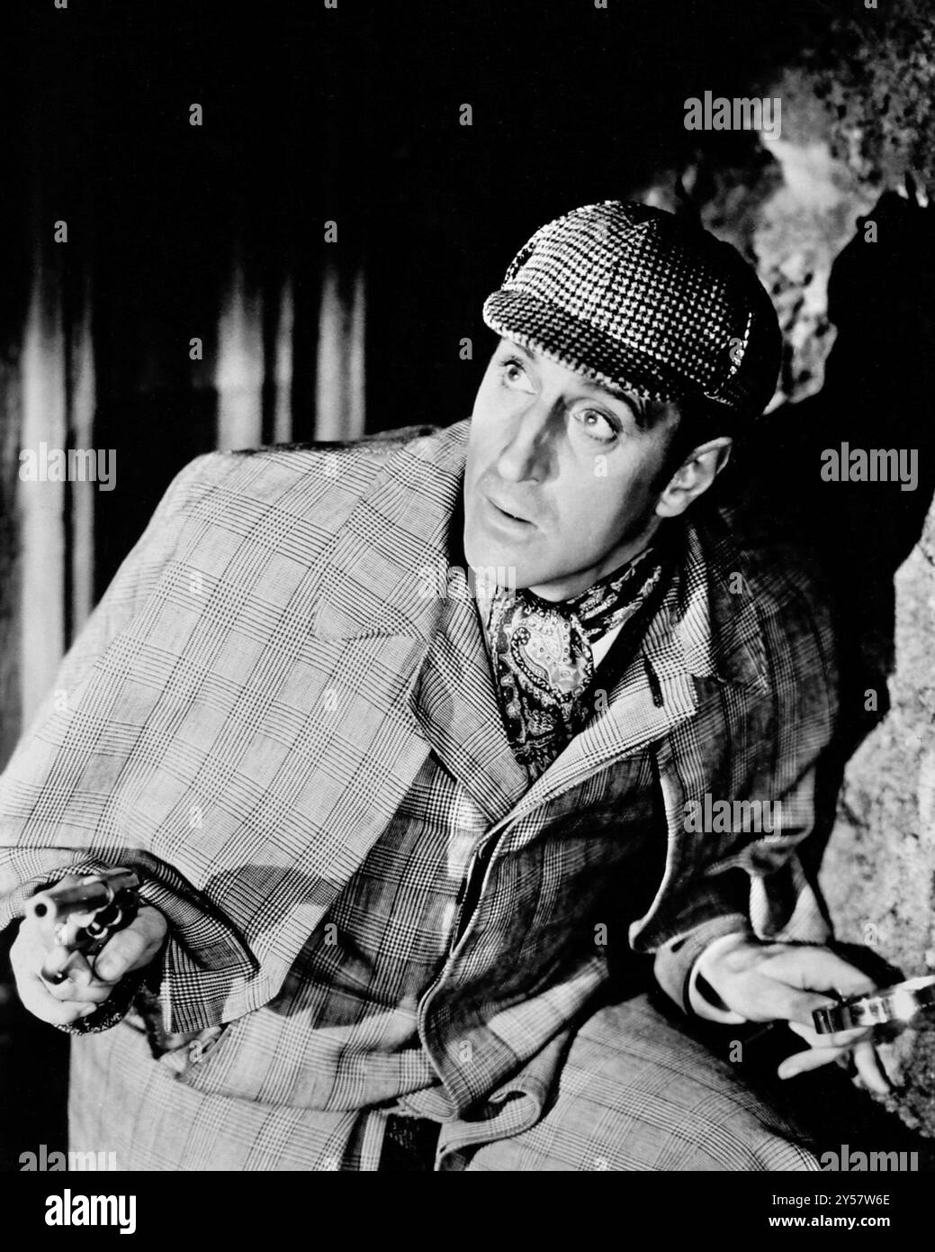 Basil Rathbone dans le rôle de Sherlock Holmes. Portrait de l'acteur anglo-sud-africain, Philip préparé John Basil Rathbone (1892-1967), publicité encore, années 1930 Banque D'Images