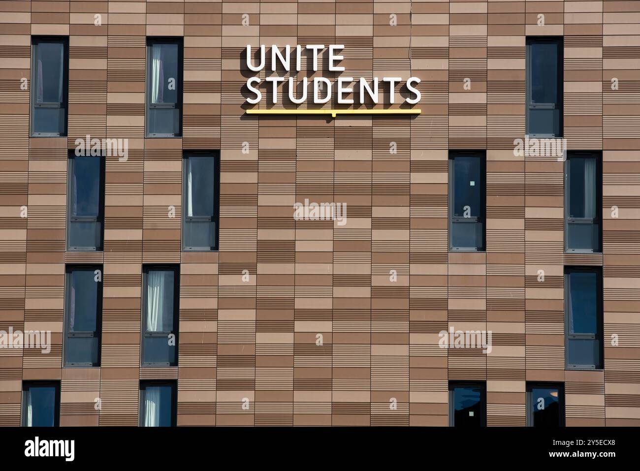 Vue générale d'une résidence Unite Students à l'Université de Newcastle avec le logo Unite Students affiché sous forme de signe par une journée ensoleillée. Banque D'Images