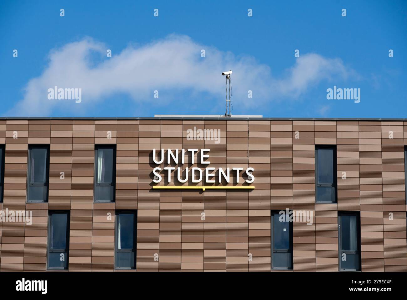 Vue générale d'une résidence Unite Students à l'Université de Newcastle avec le logo Unite Students affiché sous forme de signe par une journée ensoleillée. Banque D'Images