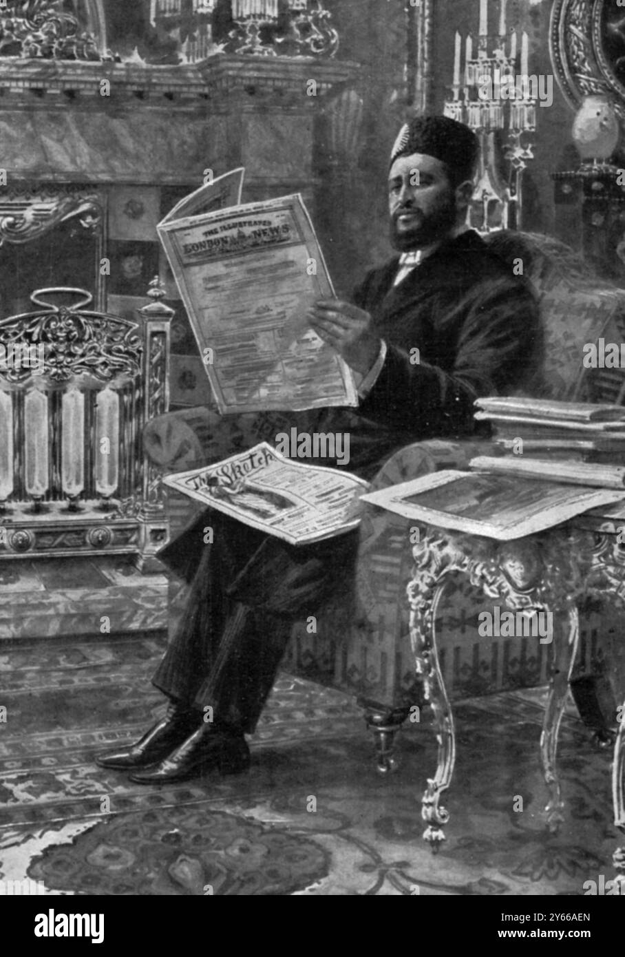 Feu Amir gardant le contact avec les affaires occidentales en lisant l'Illustrated London News Banque D'Images