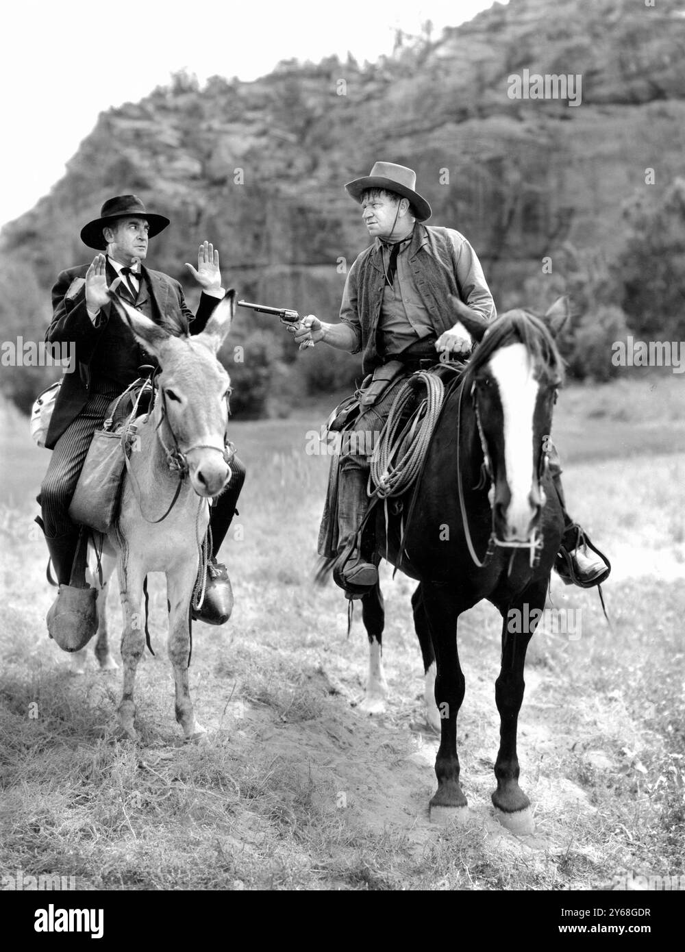 Wallace Beery (à droite), sur le plateau du film WESTERN, 'The Bad Man of Brimstone', Loew's Inc, 1937 Banque D'Images