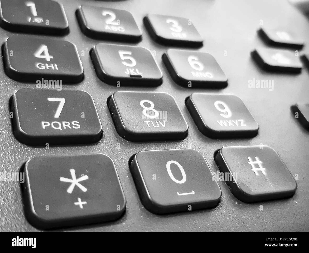 Gros plan des numéros du clavier sur un téléphone noir Banque D'Images