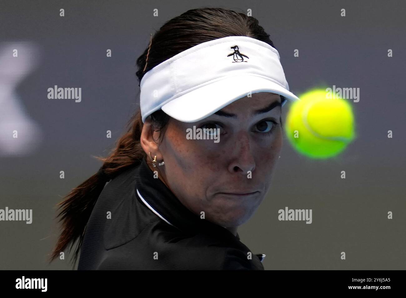 Australia's Ajla Tomljanovic eyes the ball as she returns a shot from Colombia's Camila Osorio during the China Open tennis tournament held at the National Tennis Center in Beijing, Thursday, Sept. 26, 2024. (AP Photo/Ng Han Guan) Banque D'Images