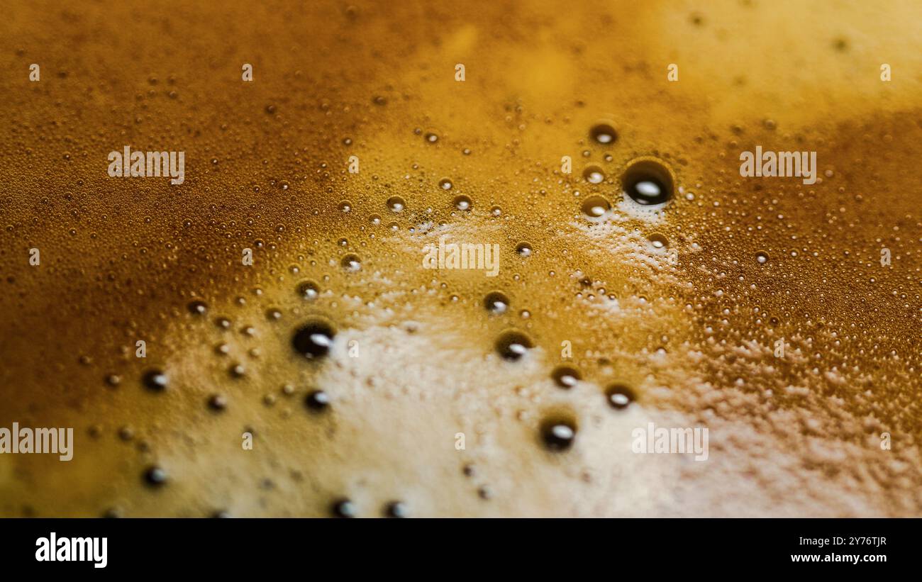 Gros plan vue de dessus mousse à texture marron de tasse à café espresso Banque D'Images