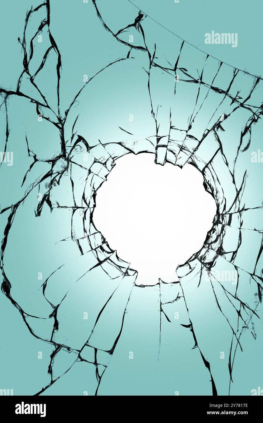 Vitrail avec un trou au milieu sur un fond bleu. Texture de fissures noires et fond blanc au centre Banque D'Images
