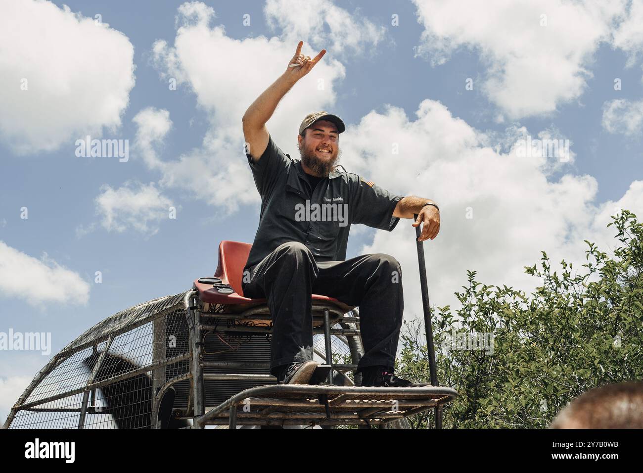 Conducteur souriant d'un hydroglisseur dans le parc national des Everglades, Floride, États-Unis Banque D'Images