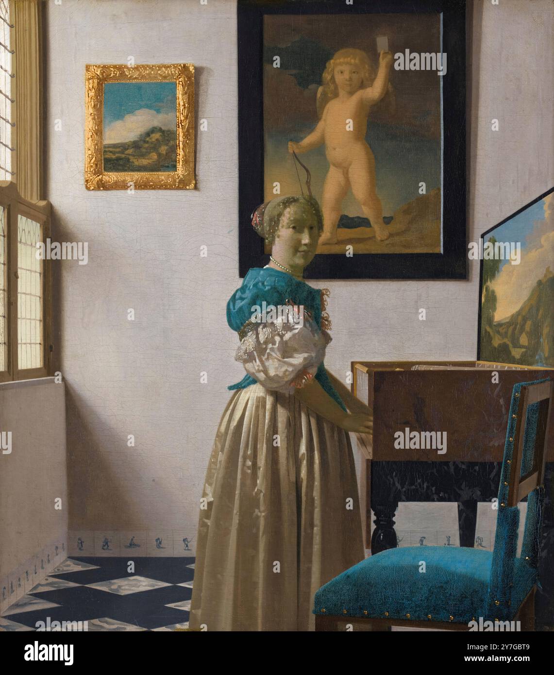 Johannes Vermeer, Une jeune femme debout à une virginale, portrait peint à l'huile sur toile, 1670-1672 Banque D'Images