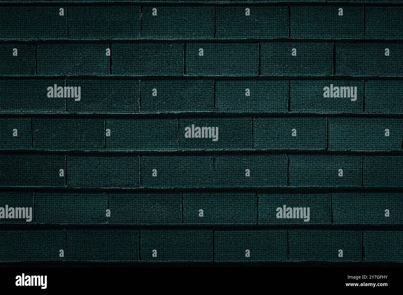 Mur de briques rugueux de couleur vert foncé gros plan Banque D'Images