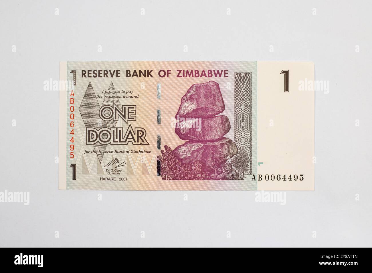 Zimbabwe billet d'un dollar avec Chiremba Balancing Rocks et Color-Shifting Zimbabwe Bird Banque D'Images