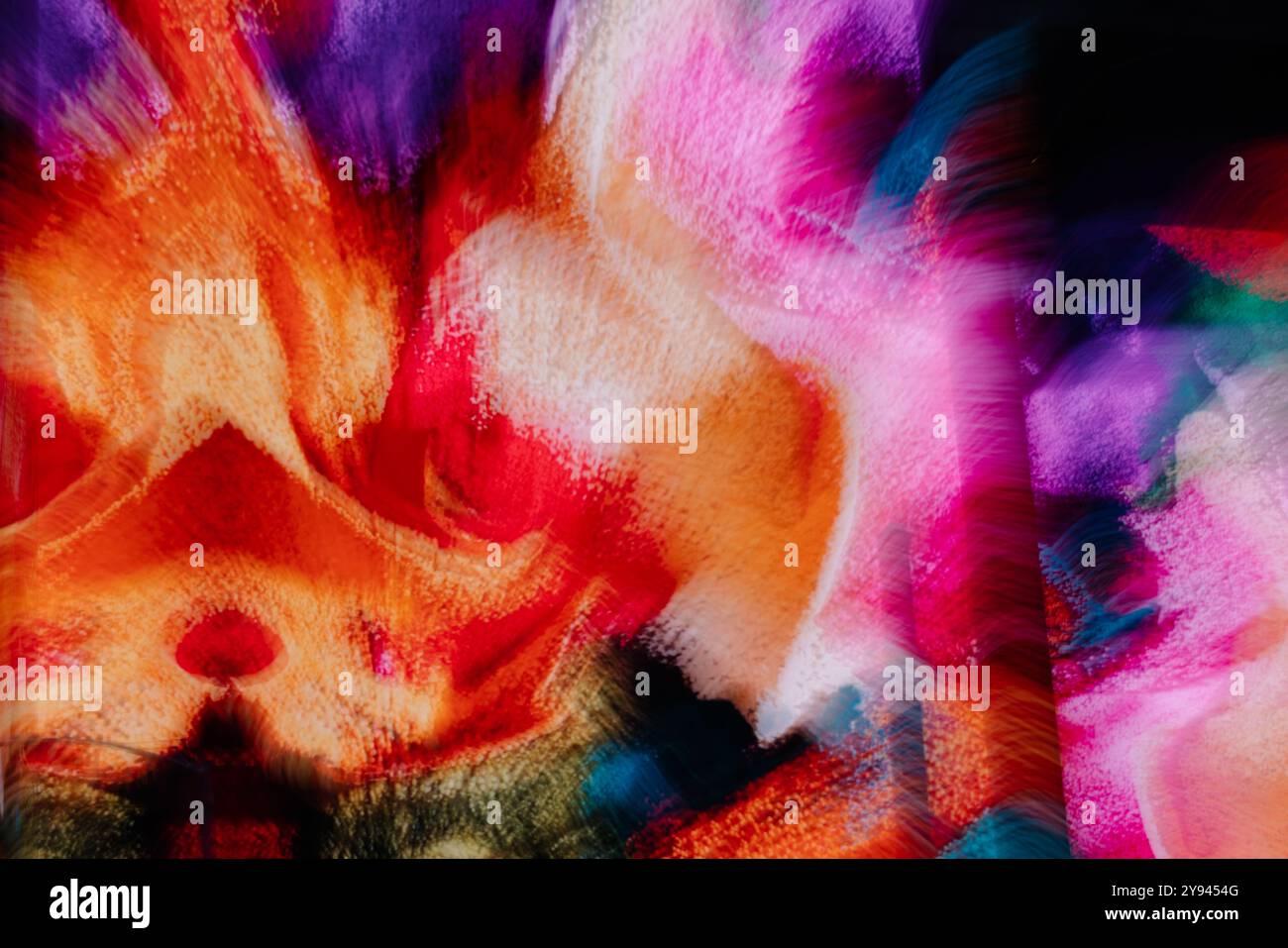 Une œuvre d'art abstraite vivante et dynamique mettant en valeur des rouges, des oranges, des roses et des violets vifs. L'image transmet un sentiment de mouvement et de créativité à travers Banque D'Images