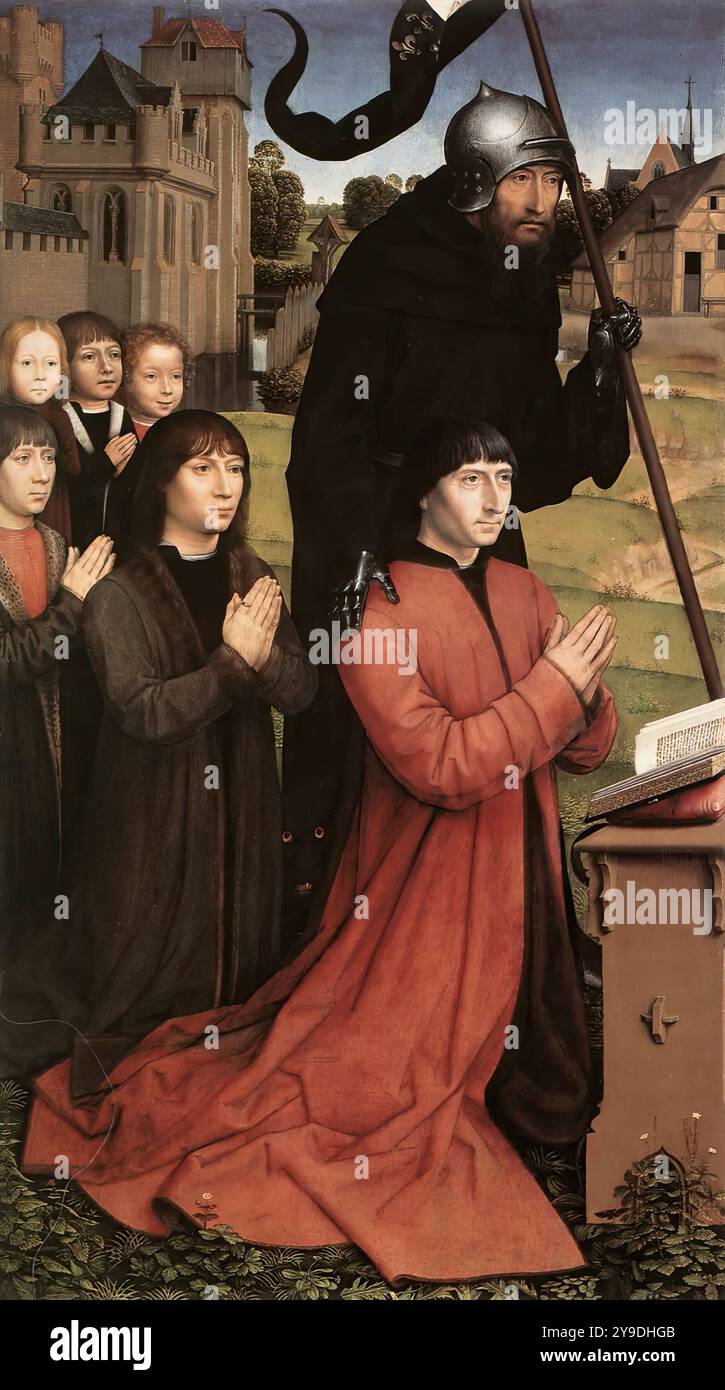 MEMLING, Hans (né vers 1440, Seligenstadt, d. 1494, Bruges) Triptyque de la famille Moreel (aile gauche) 1484 huile sur bois, 141 x 87 cm Musée Groeninge, Bruges les donateurs et leurs enfants sont représentés agenouillés dans les ailes, dans un paysage qui s'étend à partir du panneau central. L'homme est protégé par Saint Guillaume de Maleval, la femme par Sainte Barbara. Le couple est Willem Moreel (décédé en 1501), un homme politique de Bruges, et son épouse Barbara van Vlaenderberch, ou van Hertsvelde (décédée en 1499). --- mots-clés : ------------- Auteur : MEMLING, Hans titre : triptyque de la famille Banque D'Images