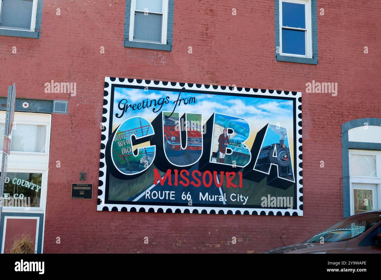 Salutations de Cuba, Missouri signe route 66 mural City Banque D'Images