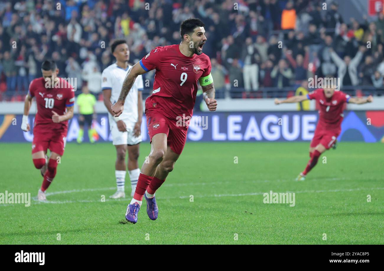 Leskovac, Serbie. 12 octobre 2024. Le serbe Aleksandar Mitrovic (C) célèbre un but lors du match de football UEFA Nations League 2024/25 League A Group A4 entre la Serbie et la Suisse à Leskovac, Serbie, Oct. 12, 2024. Crédit : Predrag Milosavljevic/Xinhua/Alamy Live News Banque D'Images