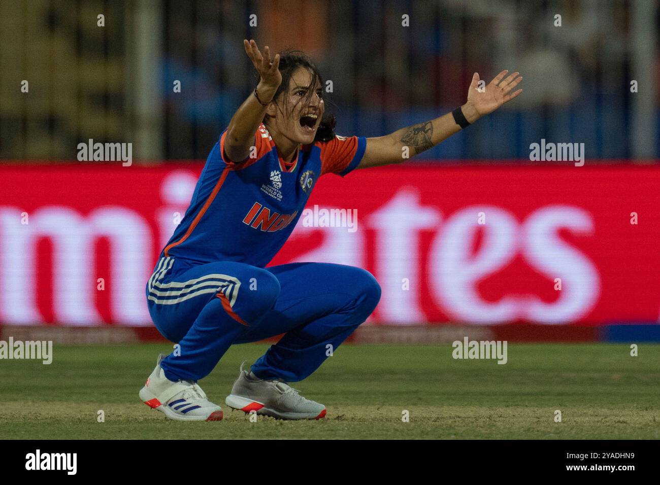 India's Renuka Thakur appeals unsuccessfully for the wicket of Australia's Tahlia McGrath during the ICC Women's T20 World Cup 2024 match between India and Australia at Sharjah Stadium, United Arab Emirates, Sunday, Oct. 13, 2024. (AP Photo/Altaf Qadri) Banque D'Images