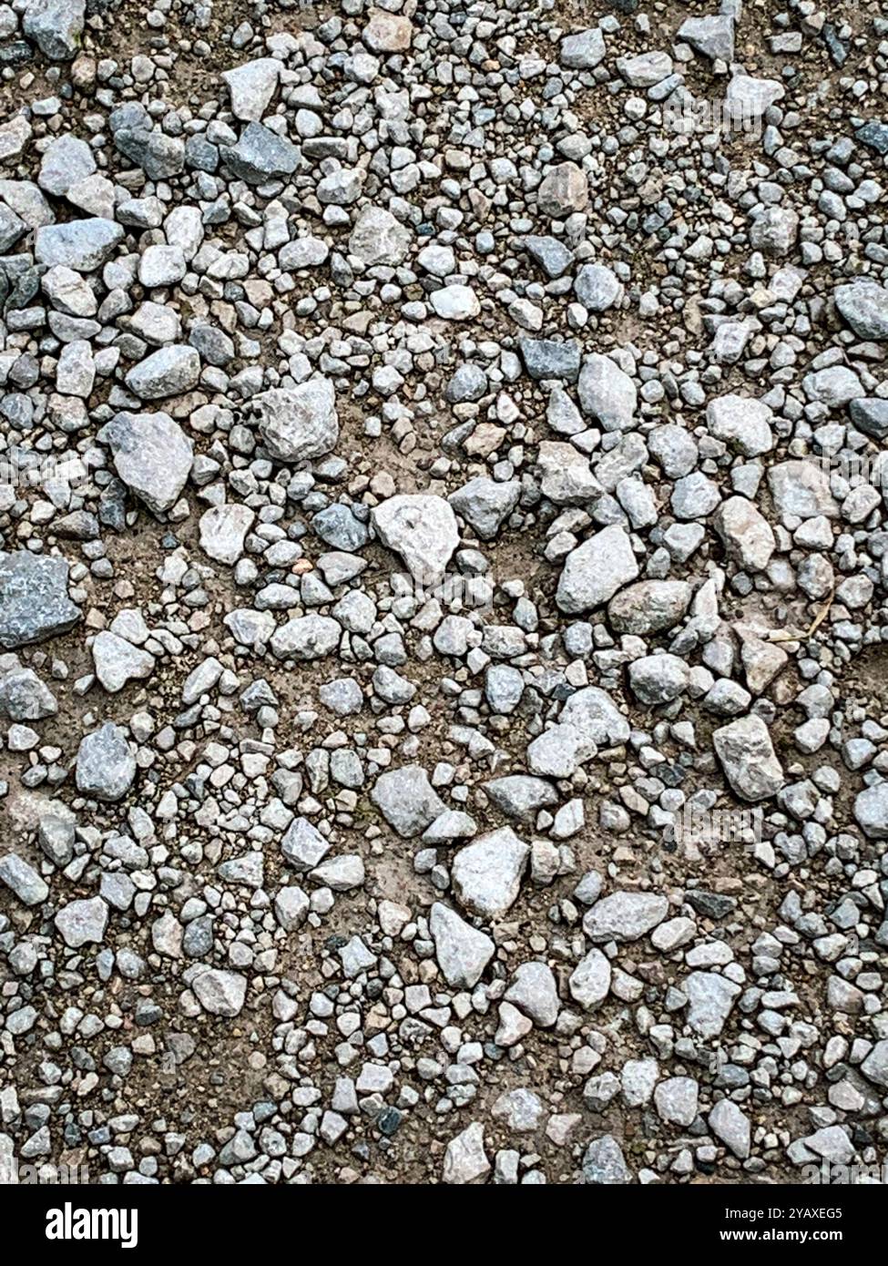Pleine trame non faite construction de route texture de gravier texture de fond. Une photo de téléphone portable avec un post-traitement de téléphone ou de tablette. - Image de stock capturée avec un smartphone