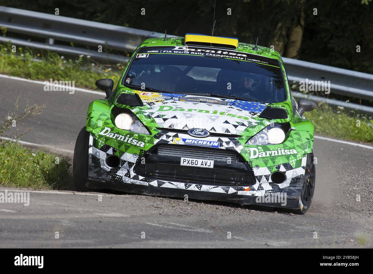 Yuriy Protasov et Pavlo Cherepin concourent sur leur Ford Fiesta RS WRC lors de la deuxième journée du rallye ADAC Deutschland le 23 août 2014 à Trèves, en Allemagne Banque D'Images