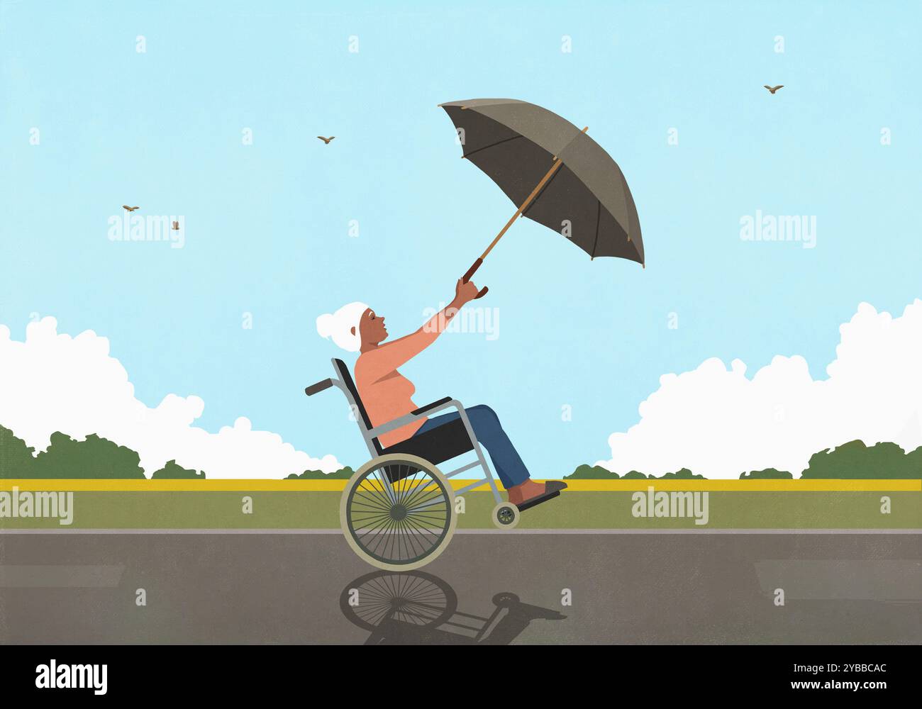 Femme âgée en fauteuil roulant utilisant un parapluie comme voile dans la campagne venteuse Banque D'Images