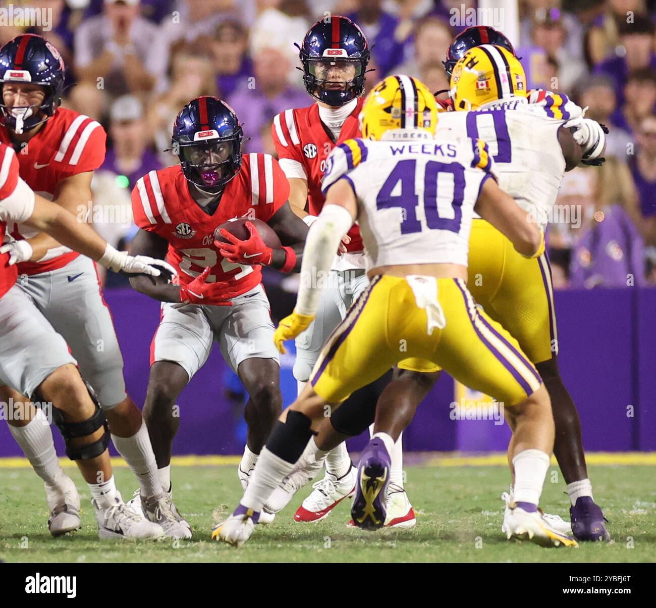 Baton Rouge, États-Unis. 12 octobre 2024. Les rebelles du Mississippi qui reviennent Ulysses Bentley IV (24) se précipitent pour un certain kilométrage en train de disputer un match de football universitaire au Tiger Stadium le samedi 12 octobre 2024 à Baton Rouge, en Louisiane. (Photo de Peter G. Forest/Sipa USA) crédit : Sipa USA/Alamy Live News Banque D'Images