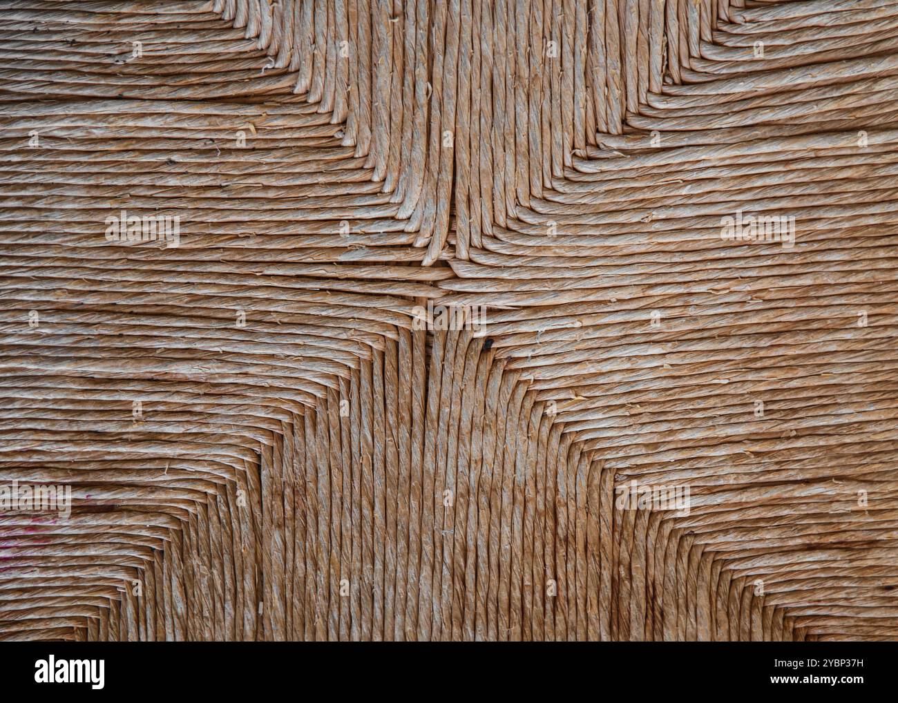 Gros plan de paille d'une vieille chaise, texture Banque D'Images