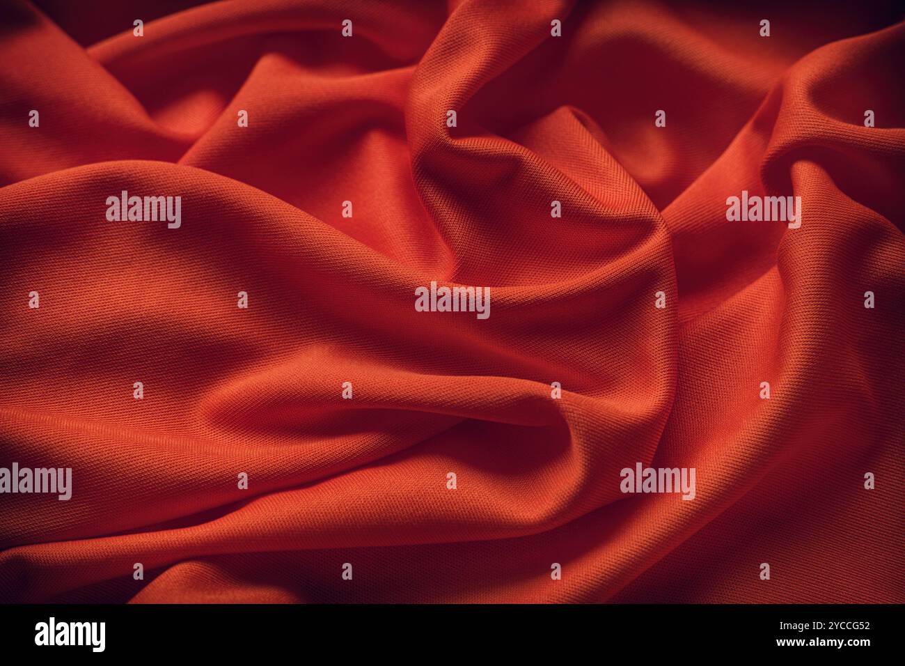 Fond de texture de tissu rouge foncé. Gros plan. Banque D'Images
