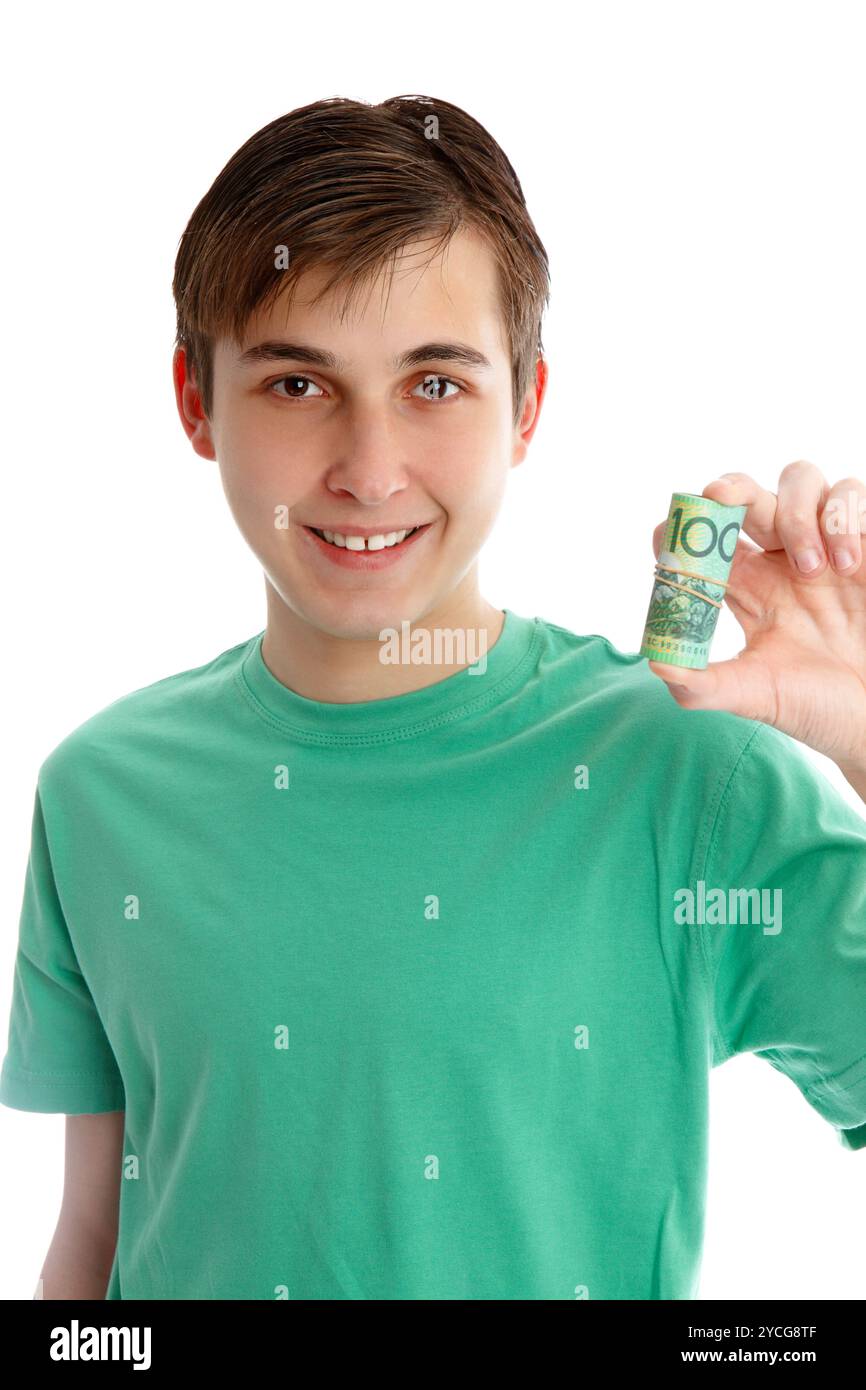 Boy holding money Banque D'Images