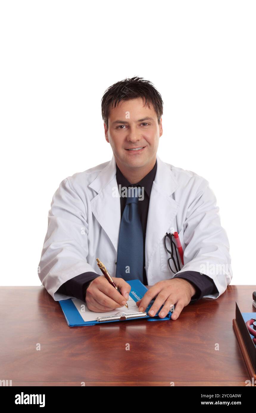 Doctor sitting at desk Banque D'Images