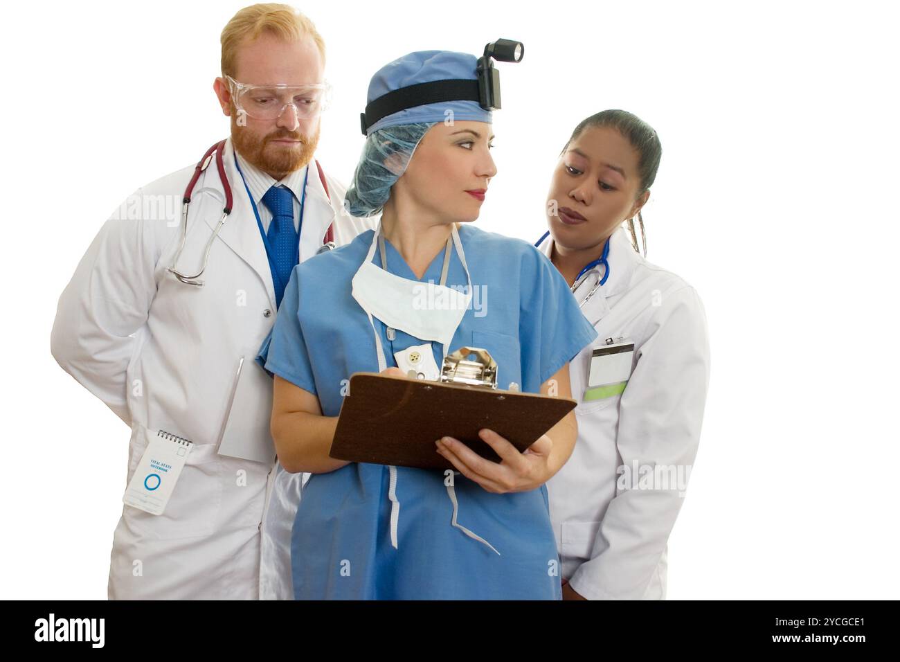 Trois médecins de la santé chirurgiens membres du personnel Banque D'Images