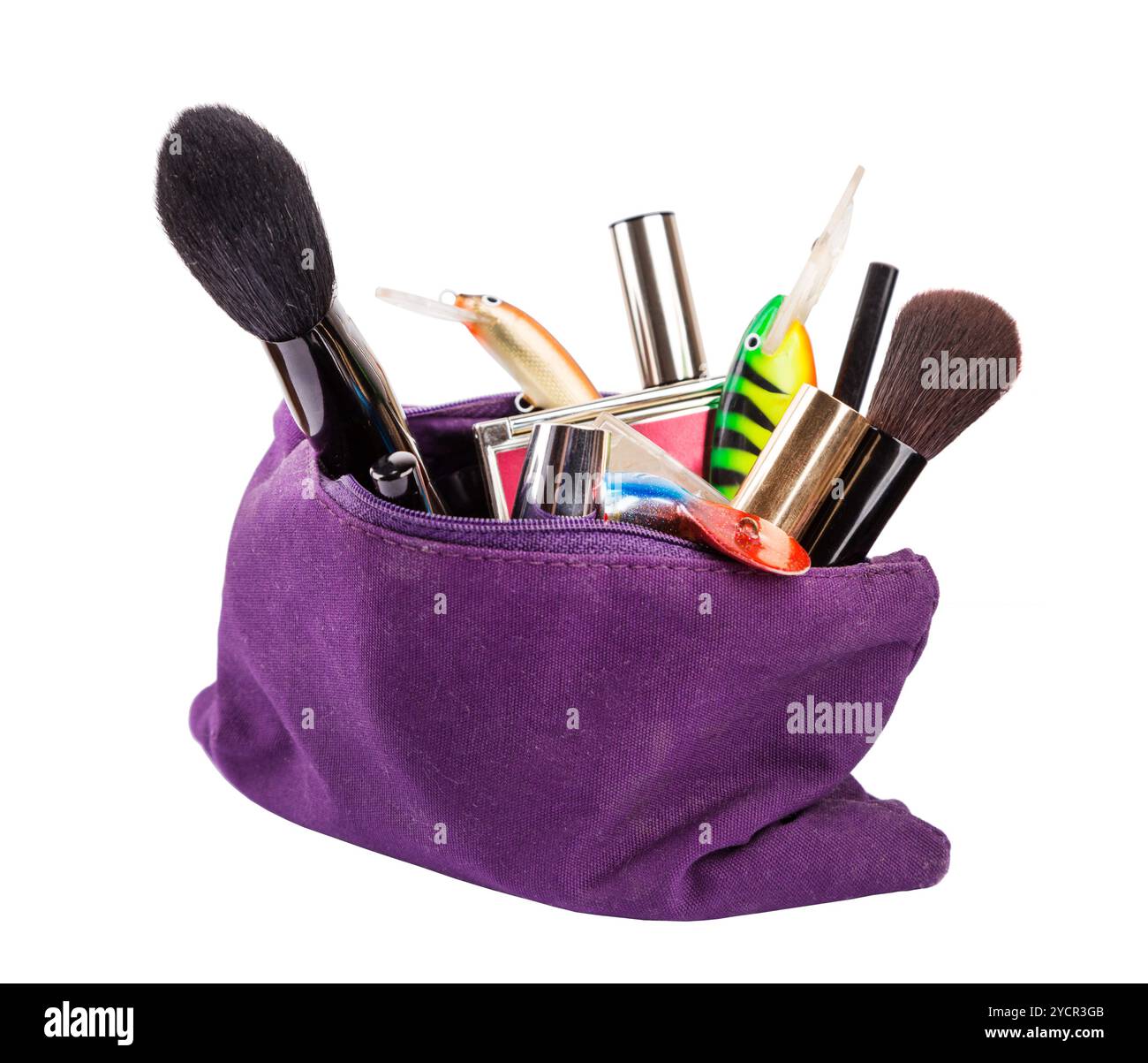 Surprise femme Beautican sac avec des outils cosmétiques et des tacles de pêche Banque D'Images