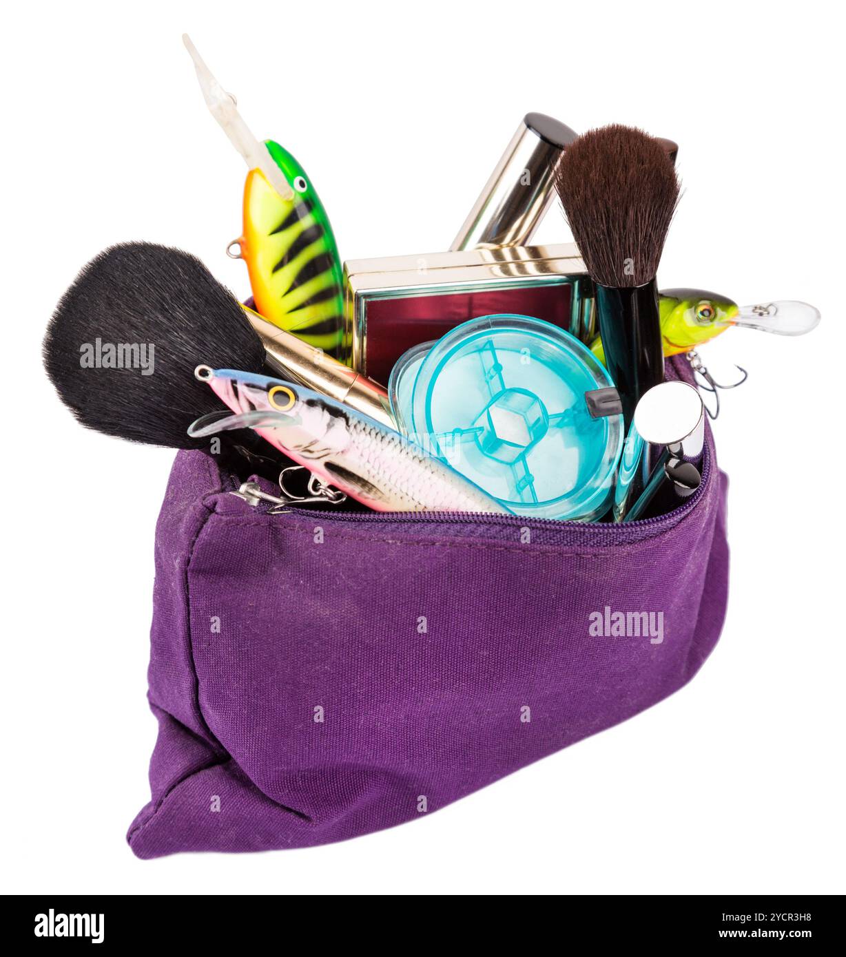 Surprise femme Beautican sac avec des outils cosmétiques et des tacles de pêche Banque D'Images