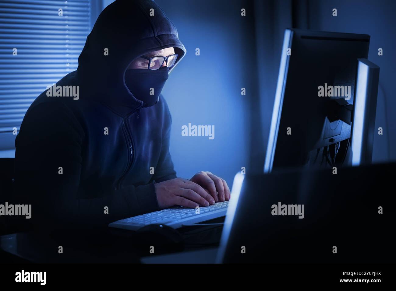 Hacker à l'ordinateur Banque D'Images