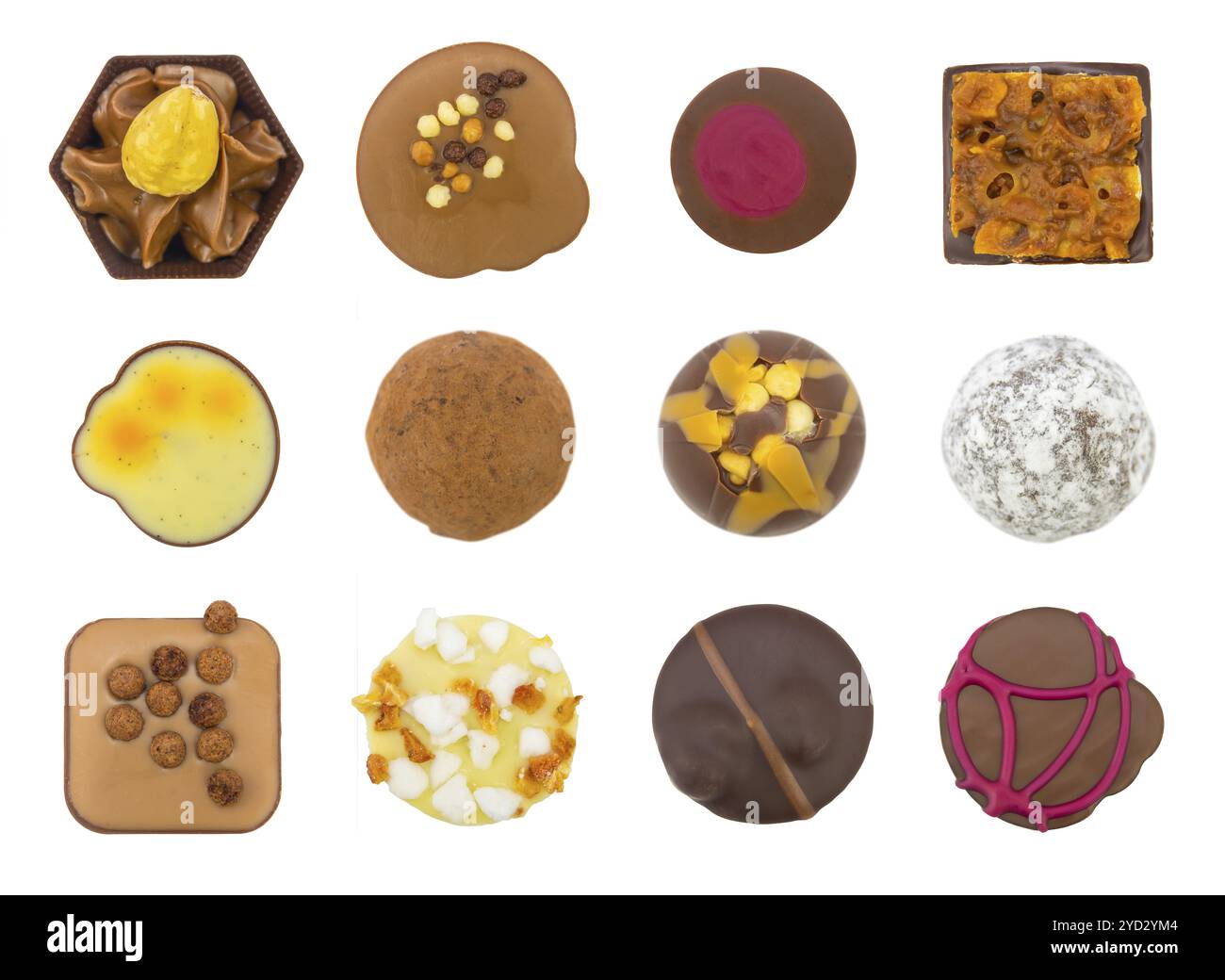 Un assortiment isolé de chocolats noirs, laitiers et blancs faits main de luxe Banque D'Images