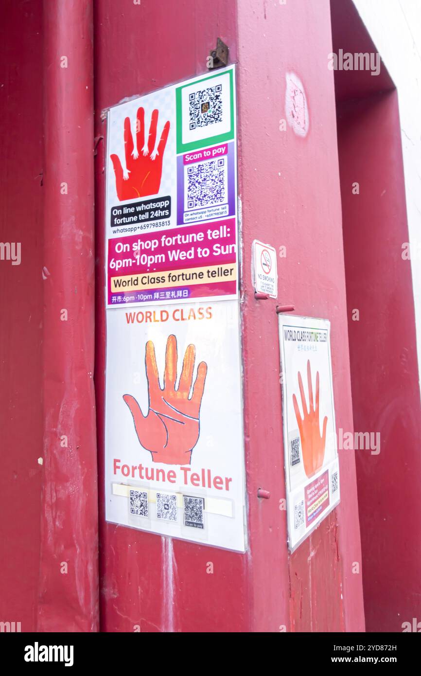 Singapour Chinatown, lecteur de palme, signe d'affiche de publicité de caissier, Banque D'Images