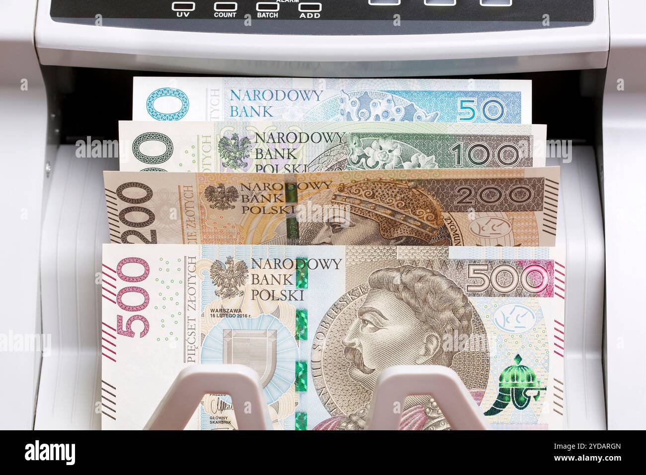 Zloty polonais dans la machine à compter Banque D'Images