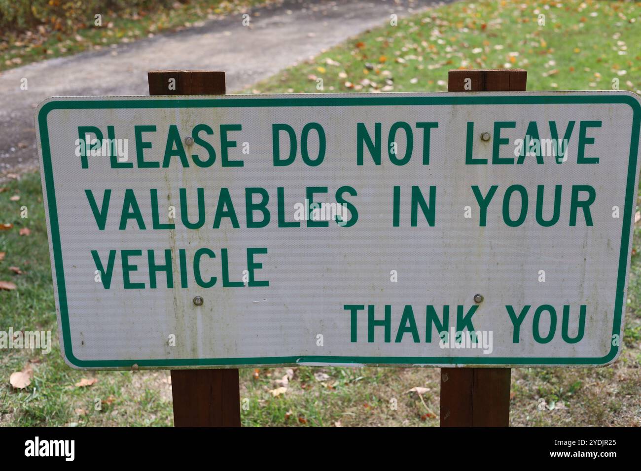 Veuillez ne pas laisser d'objets de valeur dans votre panneau de stationnement de véhicule Banque D'Images