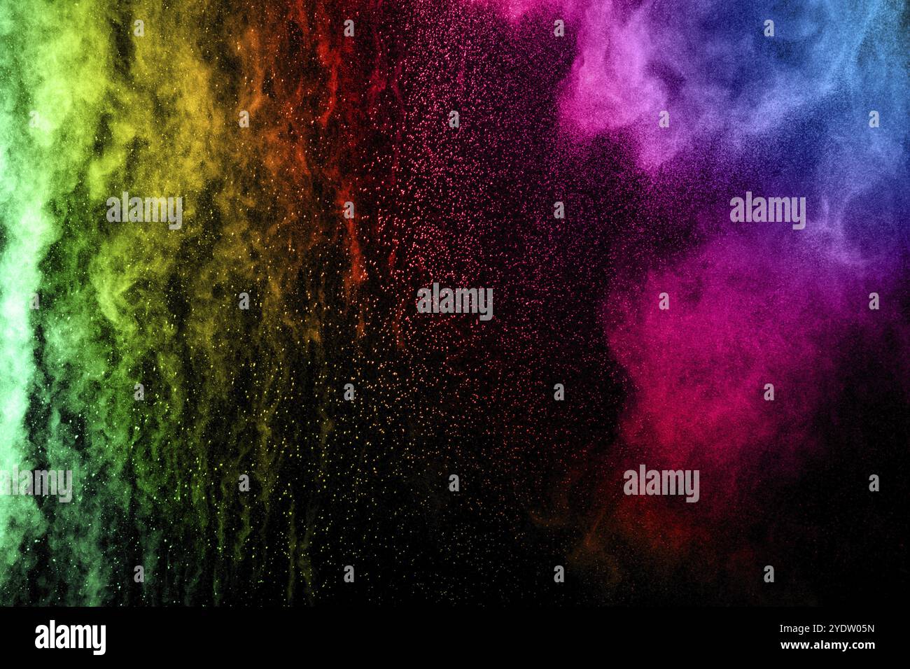 Explosion de poudre multicolore abstraite sur fond noir. Particule de poussière de couleur éclaboussée sur le fond Banque D'Images