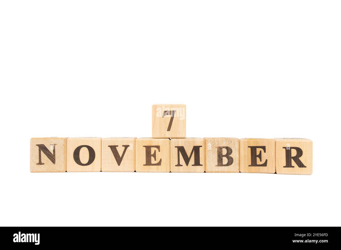 7 novembre, cube en bois sur fond blanc isolé. Hillary Clinton élue Sénat américain, première dame, bureau électif, National Retinol Day, Wales Inte Banque D'Images