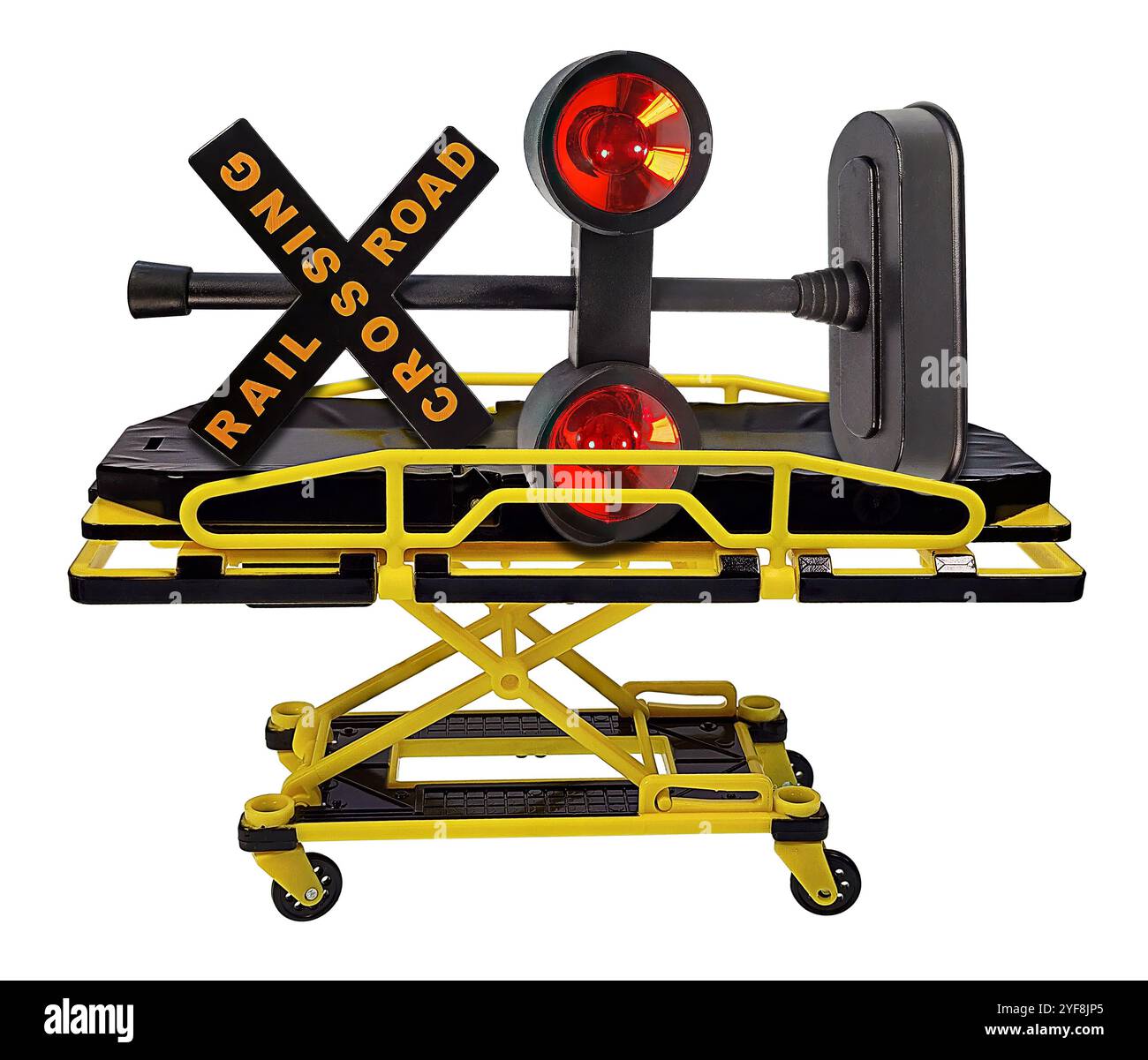 Feu de croisement de chemin de fer sur un hôpital Medical Gurney pour le transport de patients en noir et jaune pour montrer l'accident de chemin de fer Banque D'Images
