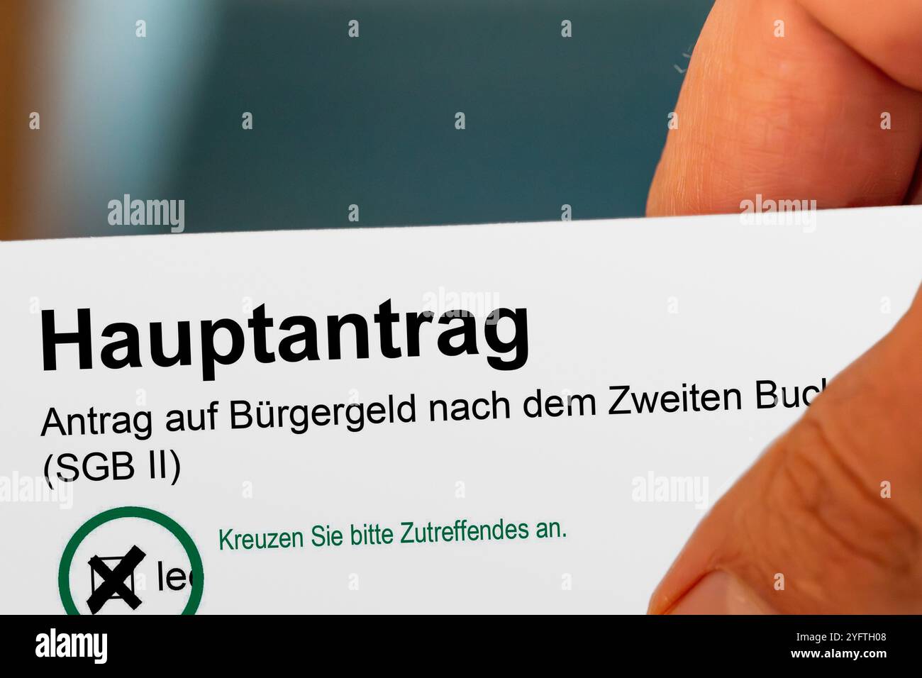 Image symbole du revenu des citoyens (Allemagne) : gros plan d'un formulaire de demande Banque D'Images