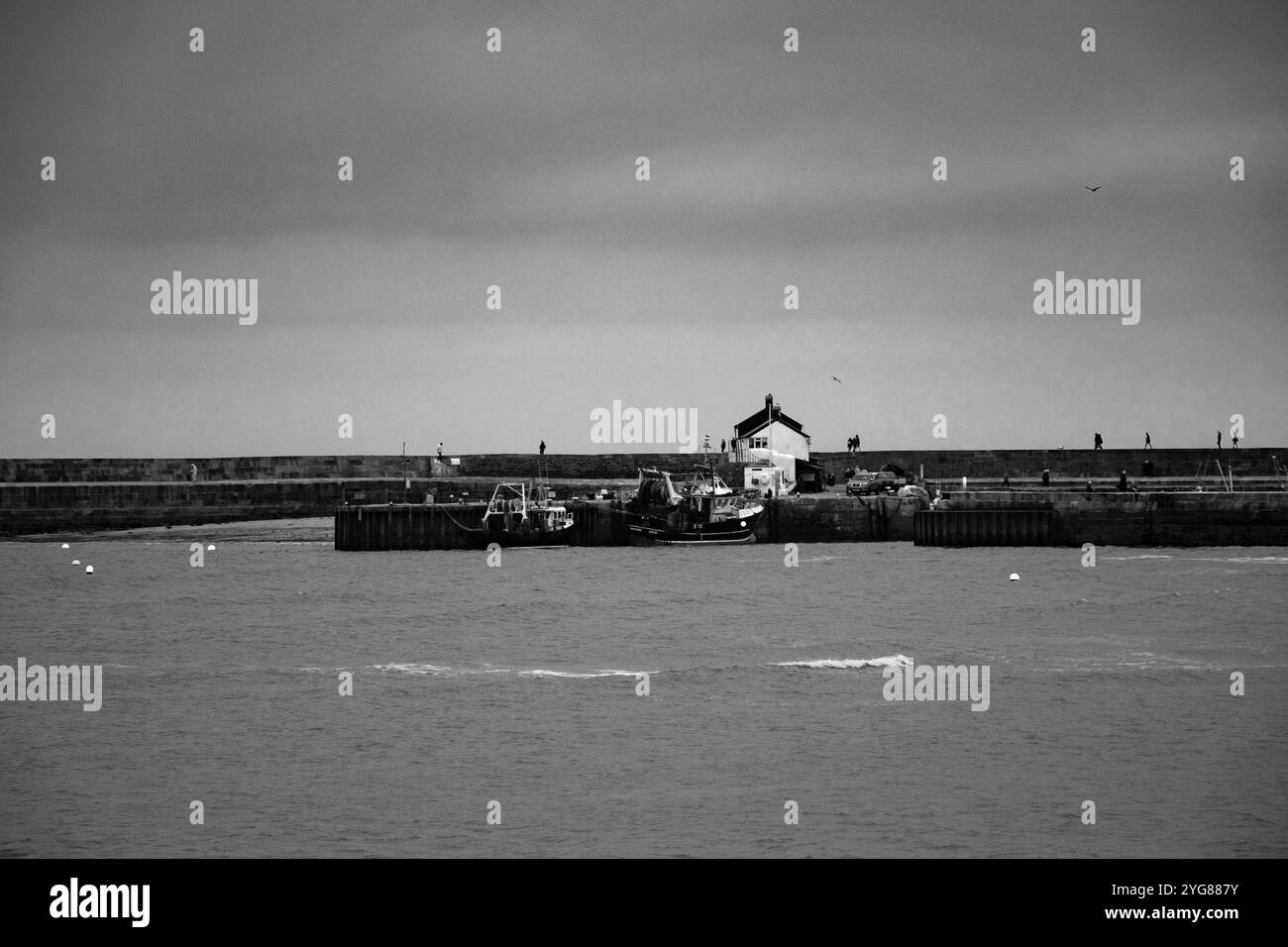 Sur le Cobb à Lyme Regis Banque D'Images