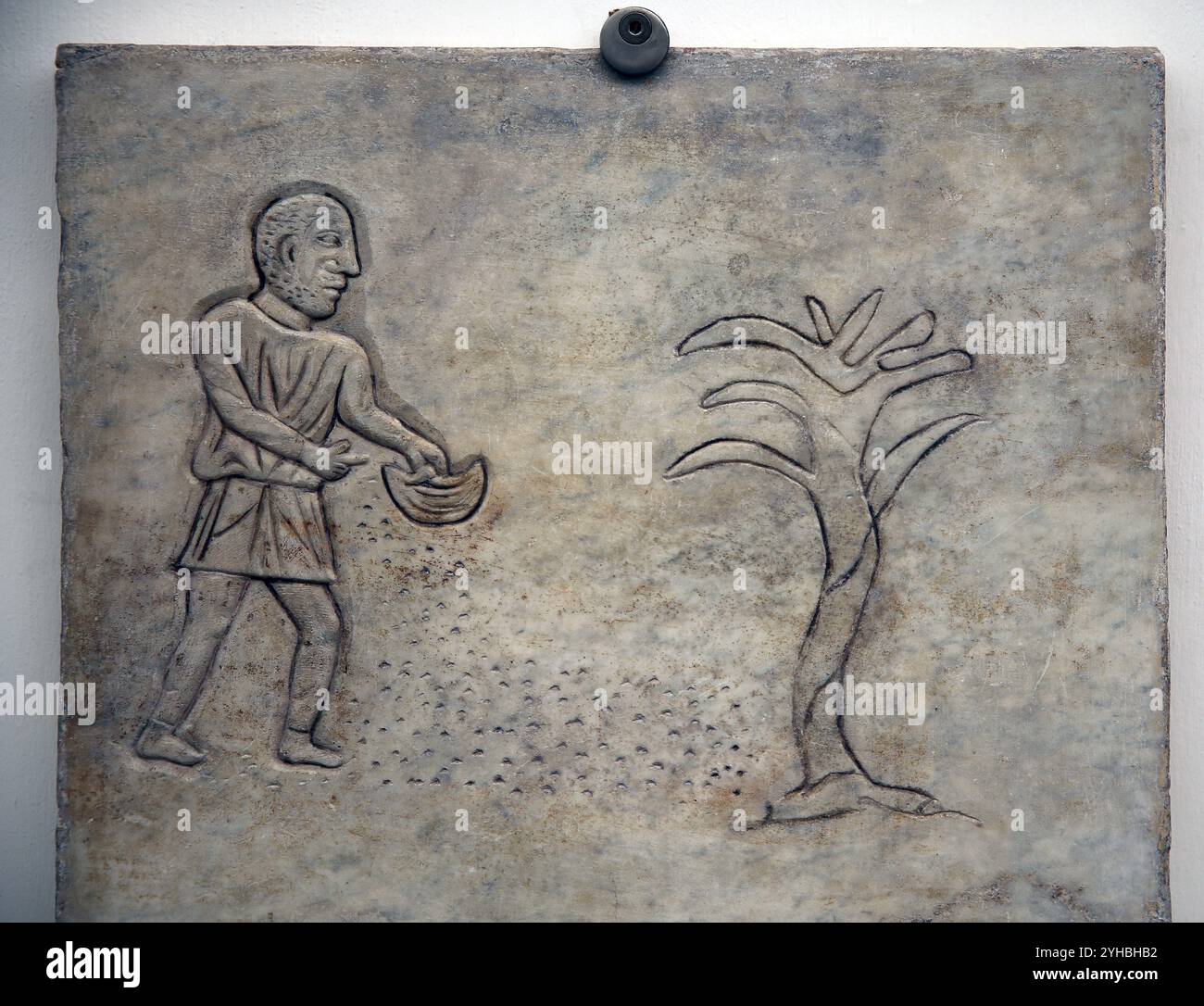 Premiers chrétiens. Pierre tombale romaine avec iconographie chrétienne. Parabole du semeur. iiie-ve siècle. Musée national romain. (Bains de Dioclétien). ROM Banque D'Images