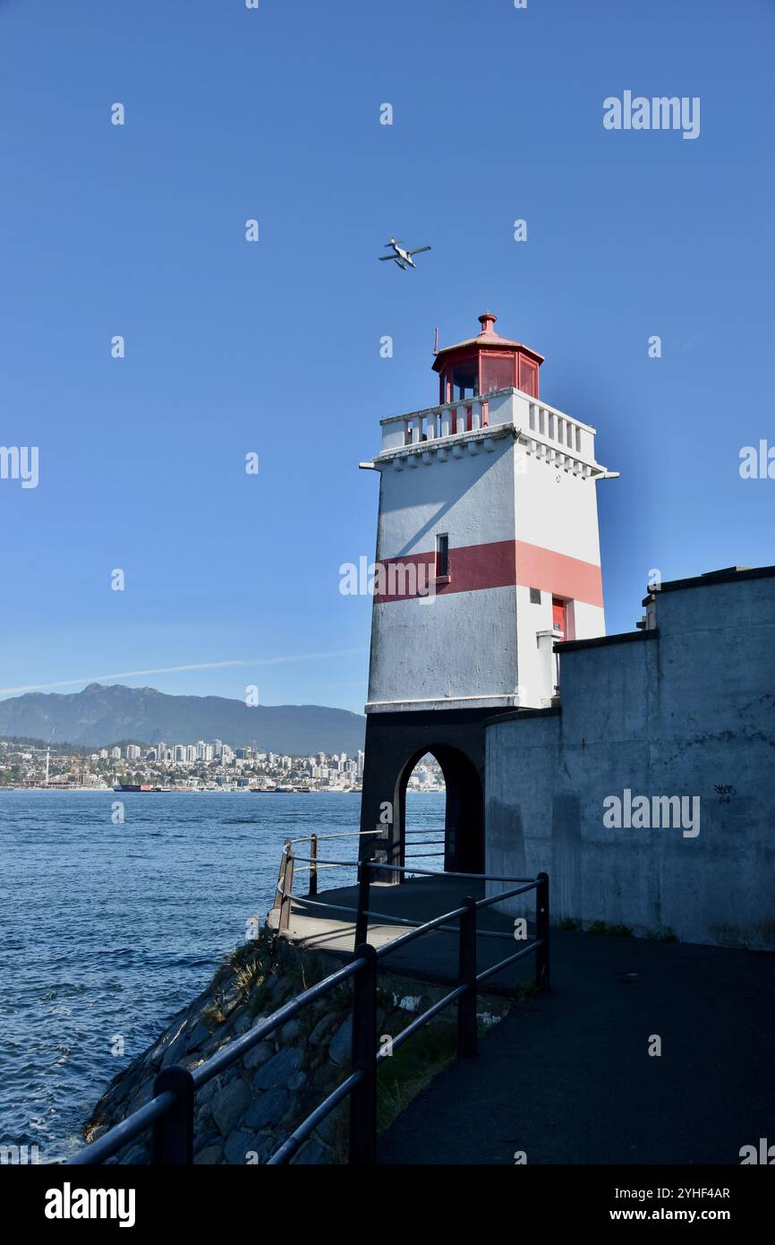 Vues autour de l'emblématique parc Stanley de Vancouver, avec des icônes telles que Vancouver Skyline, Totem Poles, Horse Drawn Tours, Lighthouses, et plus encore Banque D'Images