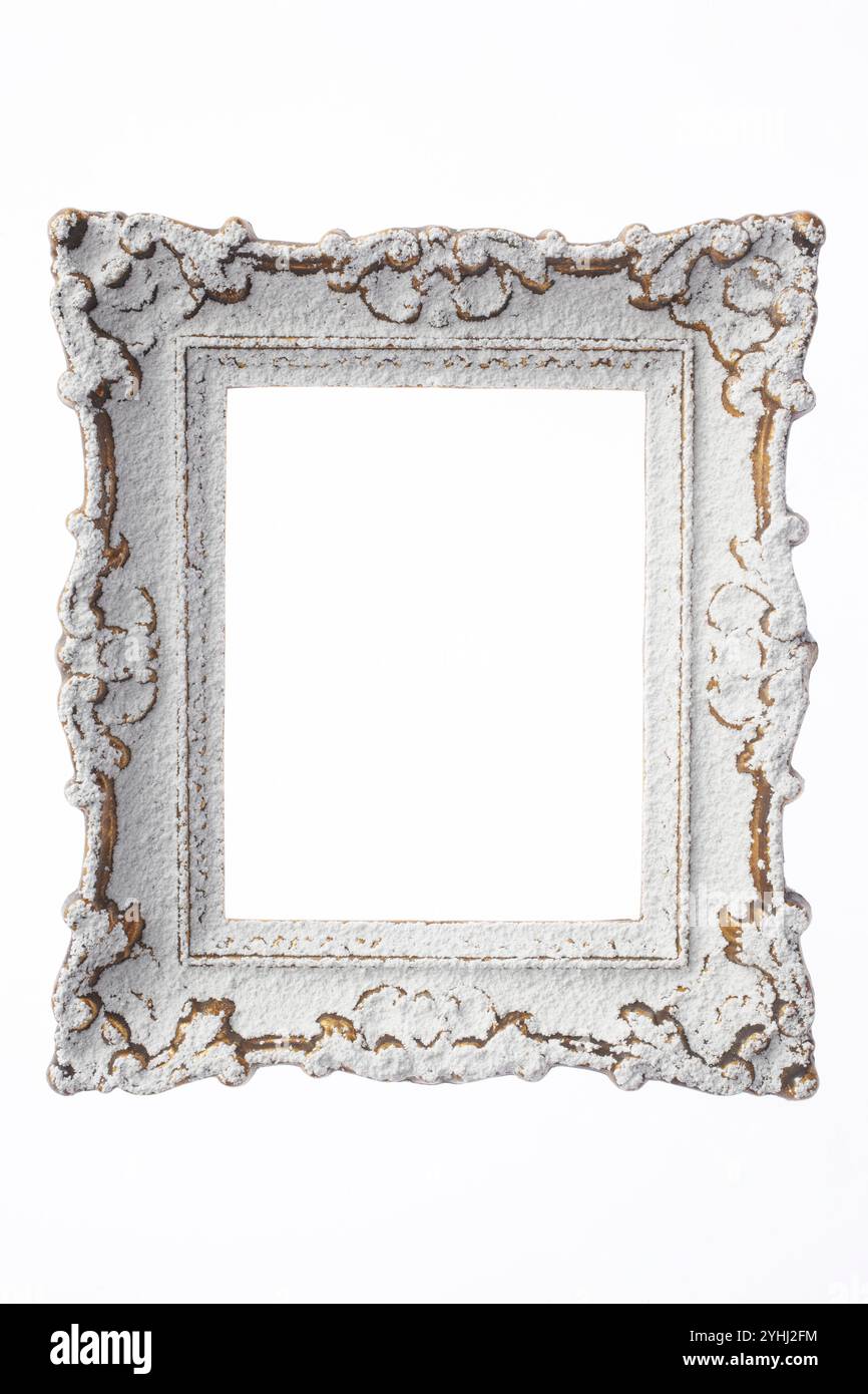 Poudre blanche sur cadre photo doré Banque D'Images