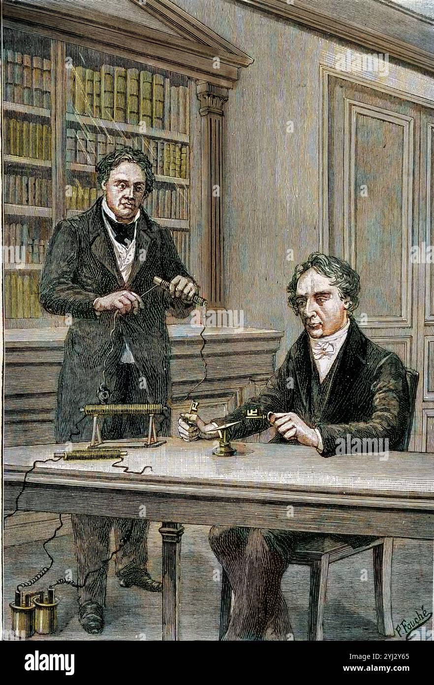 André-Marie Ampere et François Arago étudient l'électromagnétisme. Andre Marie Ampere cherchait à comprendre quand François Arago tira deux clefs de sa poche - in 'physique populaire' par Emile Desbeaux, 1891 Banque D'Images