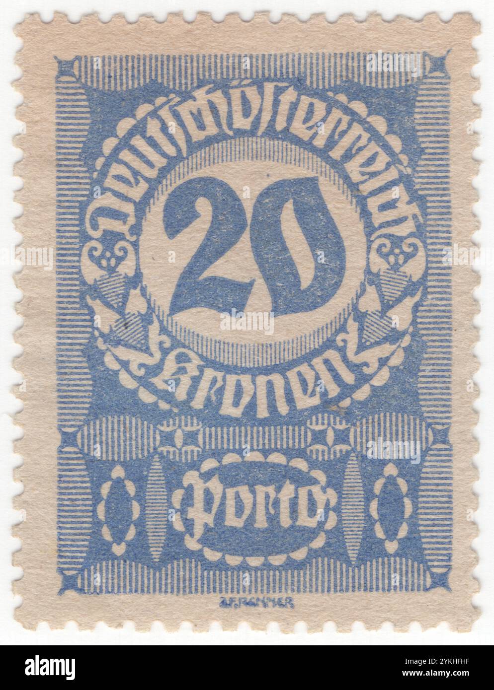 AUTRICHE — 1921 février : timbre d'affranchissement outremer de 20 couronnes représentant un chiffre de valeur (chiffre) dans un cadre circulaire avec un ornement géométrique dans le style de Blackletter, également connu sous le nom d'écriture gothique, gothique minuscule ou gothique type, était une écriture utilisée dans toute l'Europe occidentale. Avec le type italique et le type romain, la lettre noire a été l'une des principales polices de caractères de l'histoire de la typographie occidentale. Questions de la République Banque D'Images